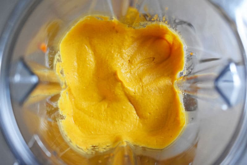 An overhead shot of the blended ingredients for the paleo sweet potato and cashew dip.