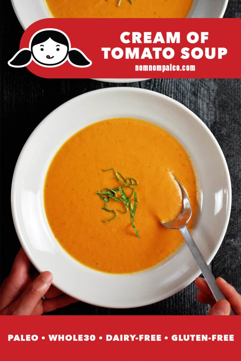 An overhead shot of a bowl of cream of tomato soup with a spoon in it. The red banner at the bottom reads: paleo, Whole30, dairy-free, and gluten-free