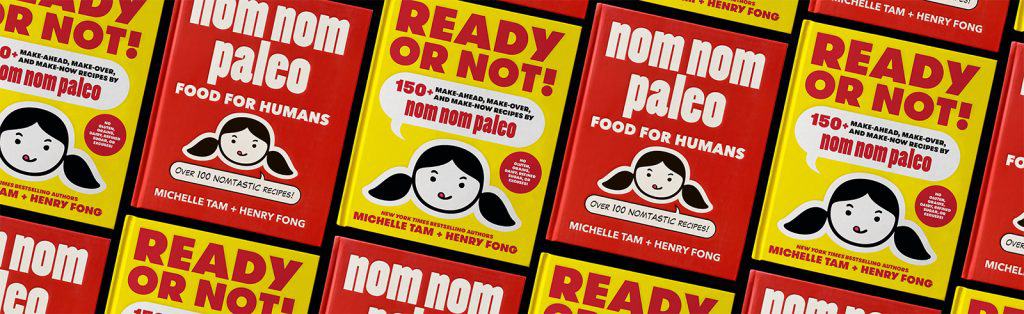 A picture of Nom Nom Paleo cookbooks that are filled with Whole30 recipes