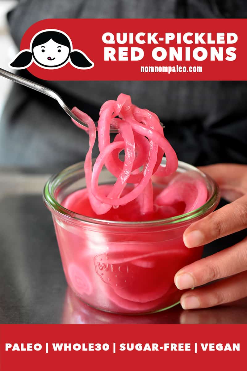 Someone in a gray apron is using a fork to lift up some quick-pickled red onions from a jar. There is a red banner at the bottom that states that they are paleo, Whole30, gluten-free, and vegan.