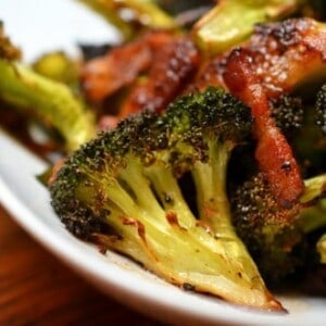 Close up of roasted broccoli and bacon.