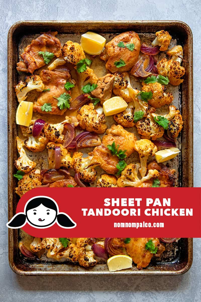 An overhead shot of quick and easy sheet pan tandoori chicken with cauliflower, a simple Whole30 and keto dinner.