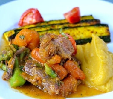 Curried goat shanks made in the slow cooker.