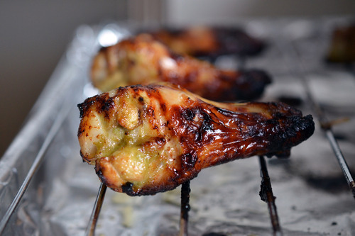Chili lime chicken wings on a wire rack.