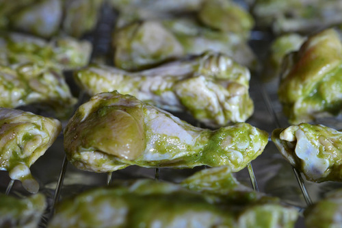 Chili lime chicken on a wire rack ready to be baked.