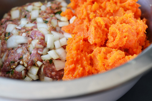 Sweet potato and lamb mixture for lamb dosas in a metal bowl.
