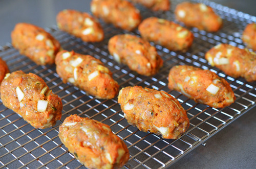 The baked lamb mixture cooling off on a wire rack.
