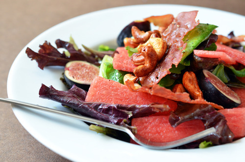 A plate of fig and watermelon salad.