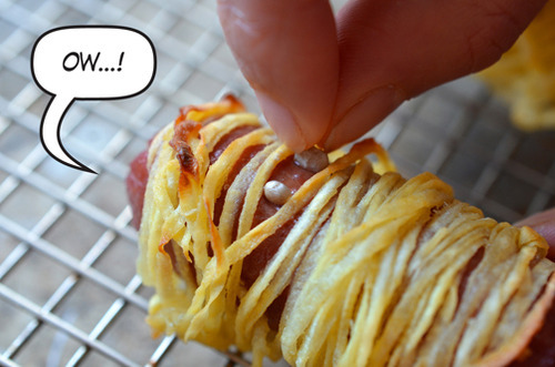 Poking sunflower seeds into the Whole30 Yummy Mummies to make eyes.