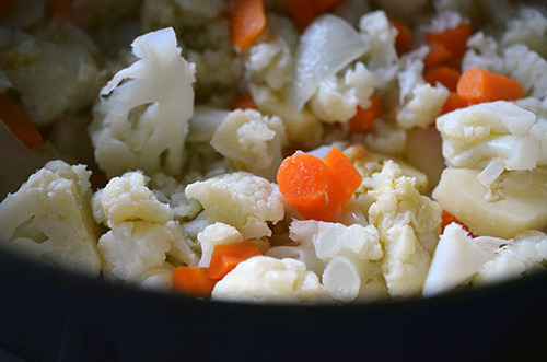 The vegetables for Roasted Garlic Autumn Root Vegetable Mash simmering.