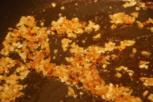 Stir frying shallots.