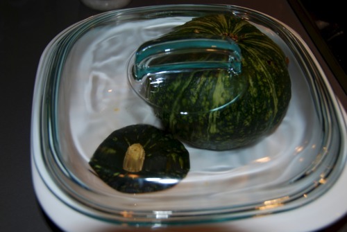 Kabocha squash in a microwaveable bowl.