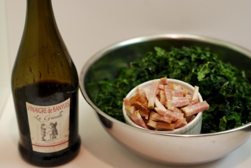 The assembled ingredients for the paleo and whole30 kale and bacon stir-fried dish.