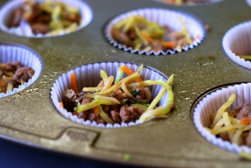 A close up of the muffin frittata mixture in a cupcake liner.