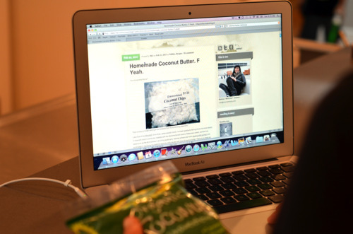 A laptop with the recipe for homemade coconut butter on the screen.