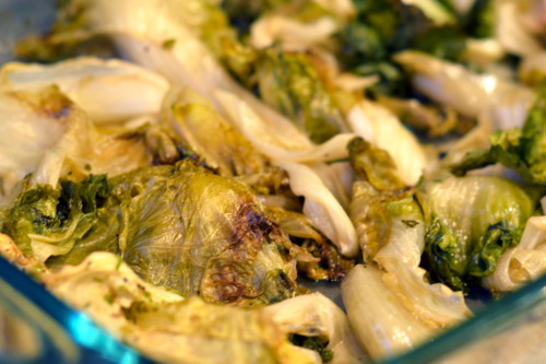 Roasted escarole in an oven-safe dish.