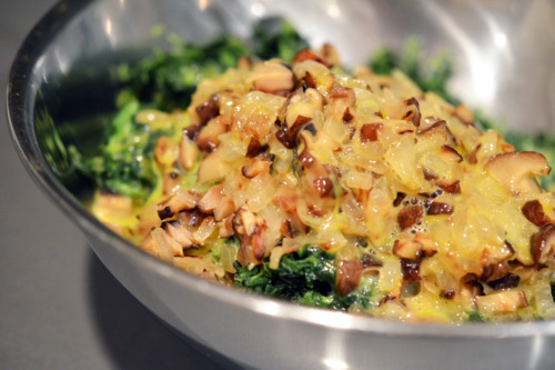 Eggs are added to the bowl with the pork slider ingredients. 