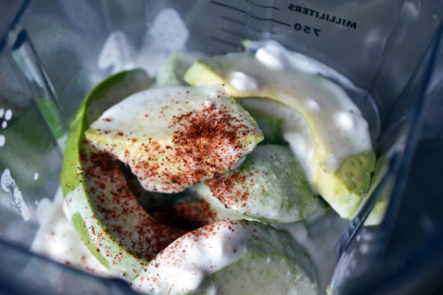 The ingredients for the chilled avocado cream soup in a blender.