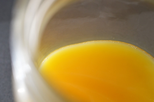 Homemade ghee in a glass jar.