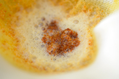 Hard bits of butter caught by the cheesecloth.