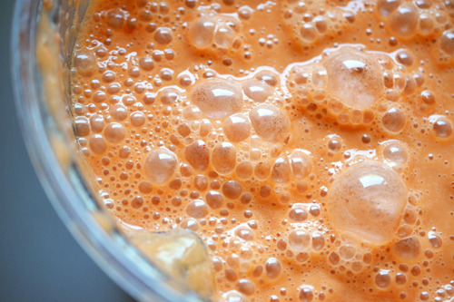 Watermelon and Tomato Gazpacho blended in a blender.