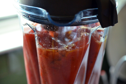 Blending all the ingredients for watermelon and tomato gazpacho.