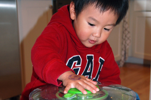 Get your kids to help you make baked kale chips! The little ones love spinning the leaves dry in a salad spinner.