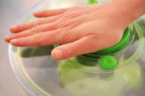 A salad spinner is the best way to dry your washed kale to make crispy baked kale chips.