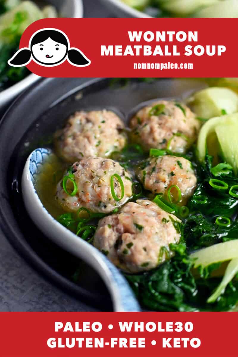 A close up of a bowl of paleo, whole30, and keto wonton soup where the bowl if filled with meatballs and baby bok choy